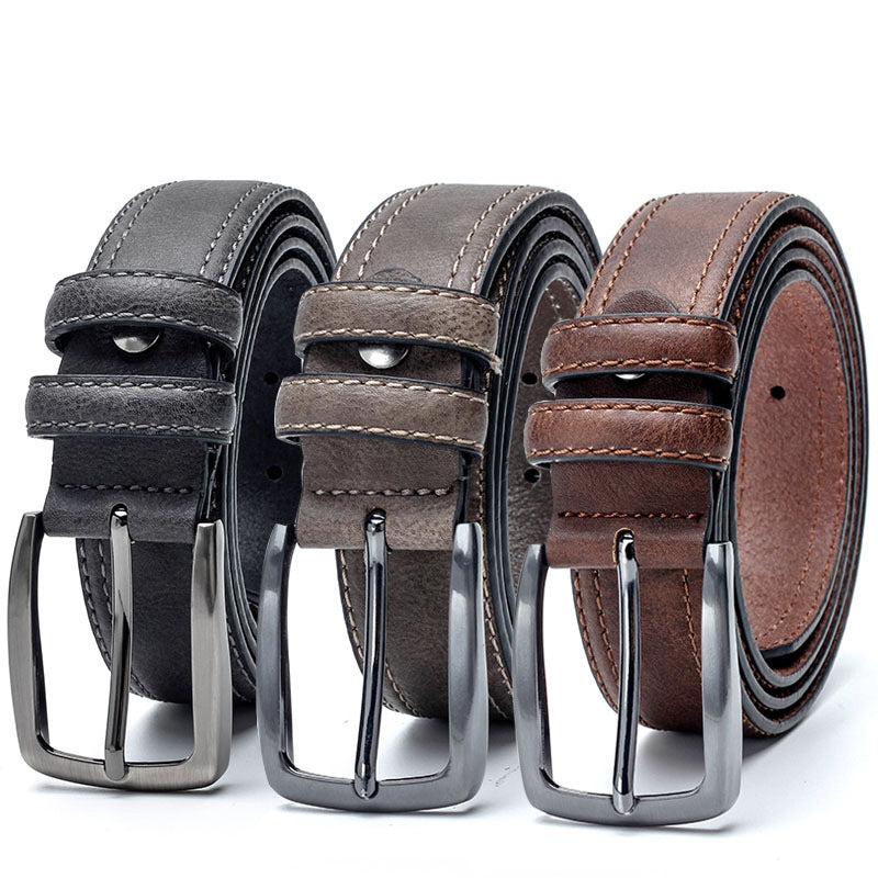 Three leather belts in black, brown, and gray with silver buckles on a white background.
