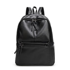 Black leather backpack on a white background