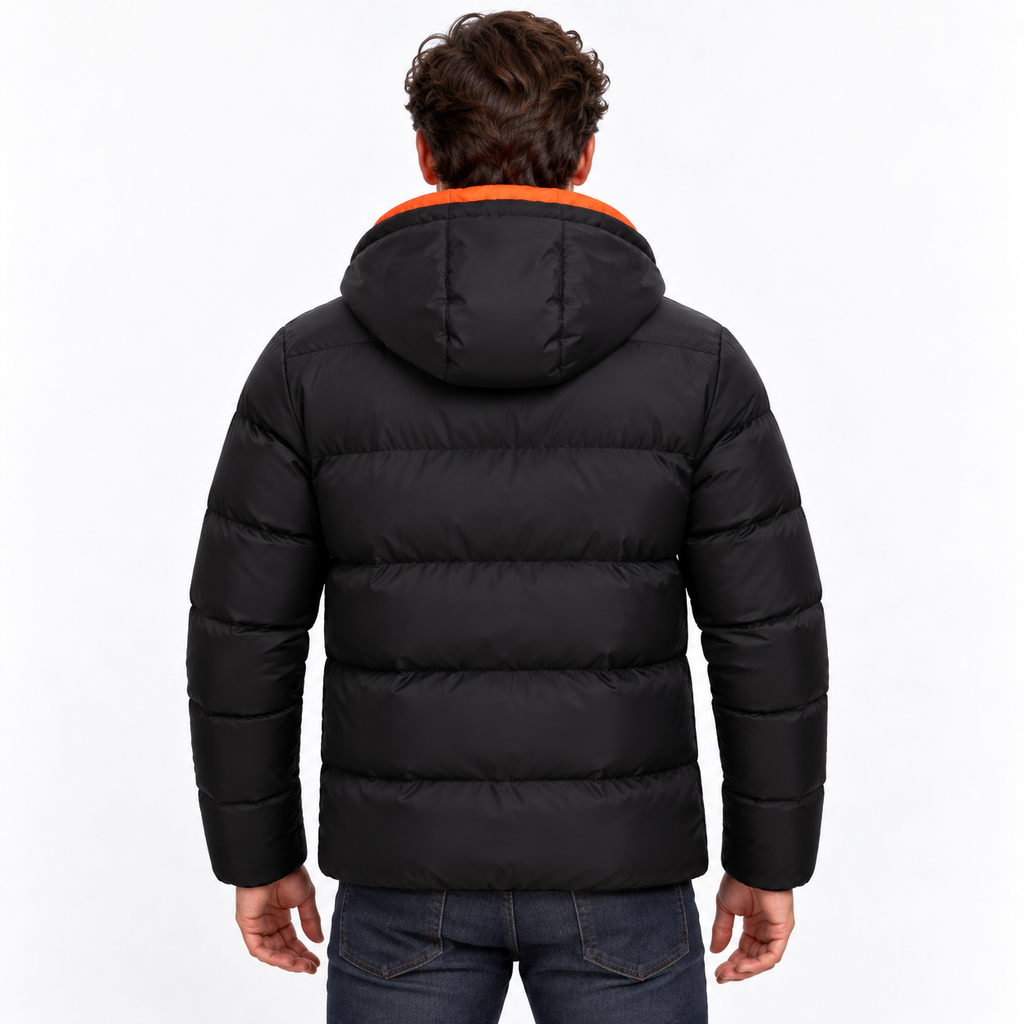 Orange - A man viewed from the back wearing a black puffer jacket with a bright orange hood lining and dark blue jeans, against a plain white background.