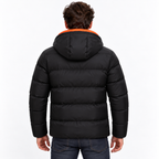 Orange - A man viewed from the back wearing a black puffer jacket with a bright orange hood lining and dark blue jeans, against a plain white background.