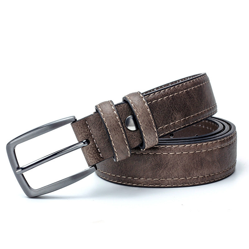 Brown leather belt with silver buckle on a white background