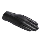 Black leather glove on a white background