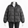Dark Gray - A dark gray puffer jacket with a high collar, front zipper, and zippered pockets, displayed on a white mannequin against a plain white background.