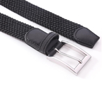 Black woven belt with a silver buckle on a white background
