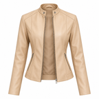 Apricot - A beige faux-leather moto jacket with a mock neck, silver-tone front zipper, and zippered side pockets, shown on a plain white background.