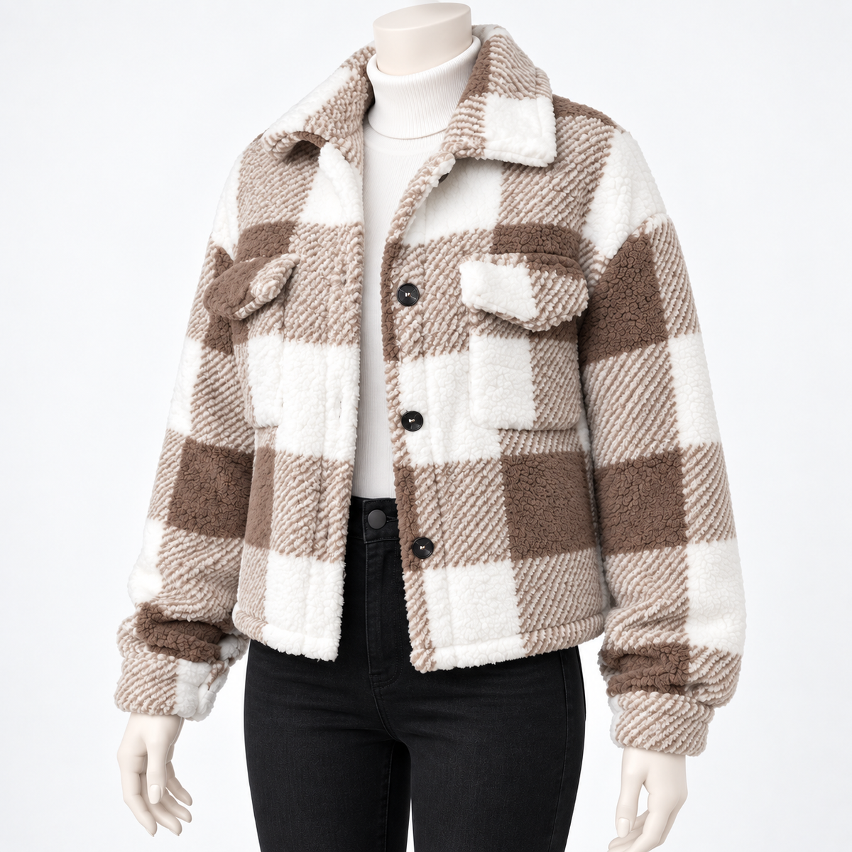 Khaki - A cropped plaid sherpa jacket displayed on a mannequin torso. The jacket features a warm brown and cream checkered pattern, a soft sherpa texture, a collar, and front flap pockets.
