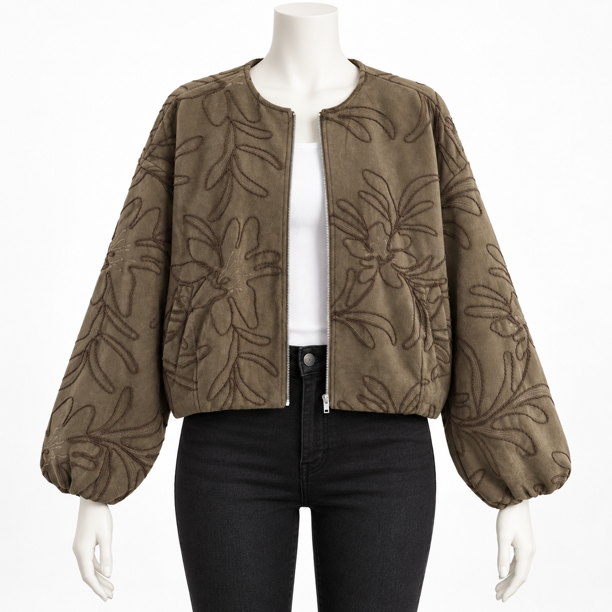 Green - A cropped, zip-front jacket with long balloon sleeves, shown on a white mannequin torso. The jacket is a muted taupe-brown color with a tonal floral jacquard pattern.