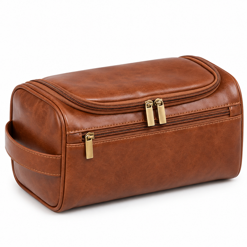 A brown faux-leather travel toiletry bag with two gold-tone zipper pulls, shown on a clean white background.