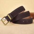 Brown belt with a gold buckle on a beige background