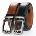 Two leather belts with silver buckles on a white background