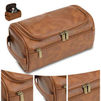Brown leather toiletry bag with gold zippers on a white background