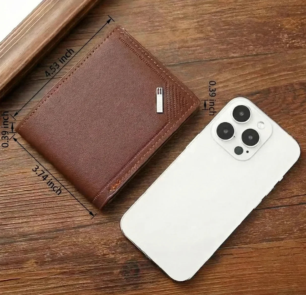 Brown wallet and white phone on a wooden surface with measurements indicated.