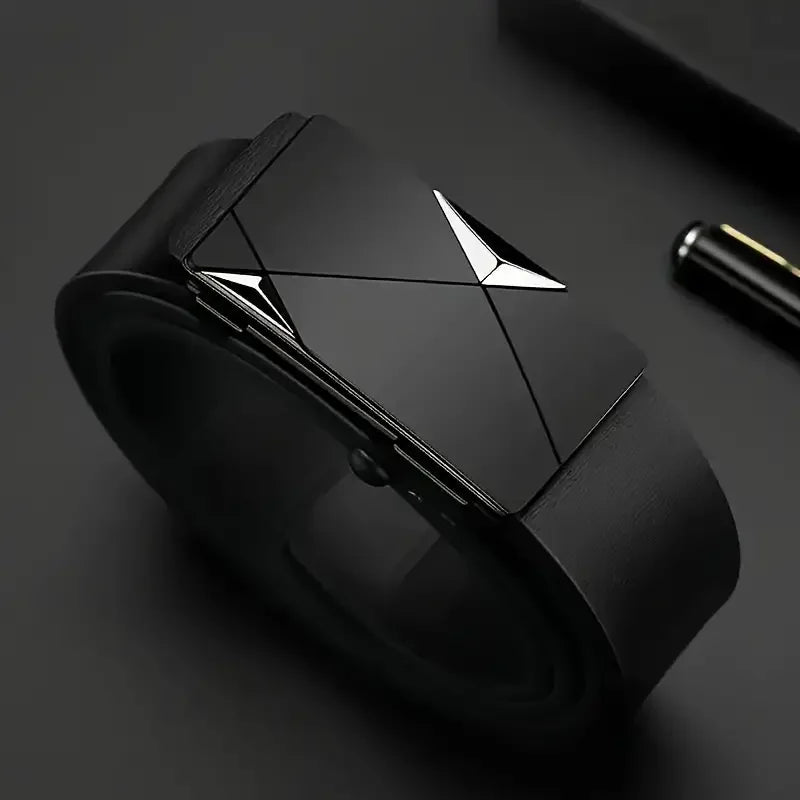 Black geometric object on a dark surface