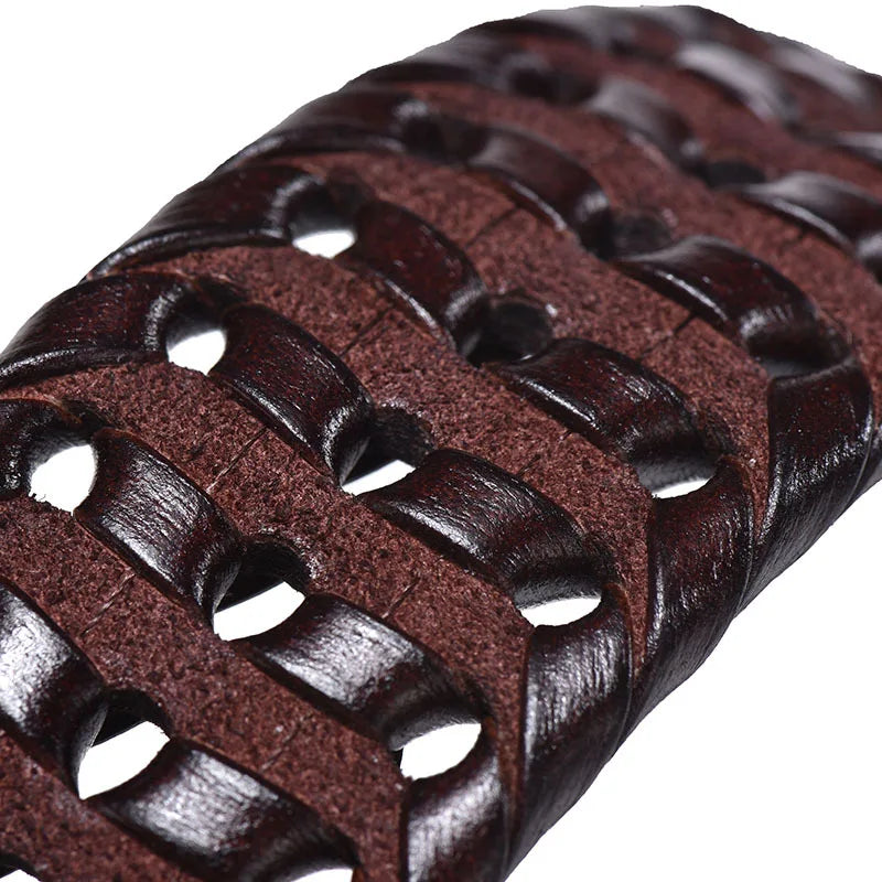 Close-up of a braided brown leather belt on a white background