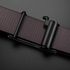 Brown leather belt with a black buckle on a dark gray background