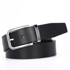 Black leather belt with silver buckle on a white background