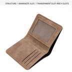 Brown leather wallet with a banknote slot and transparent window on a white background