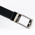 Black leather belt with a silver buckle on a white background