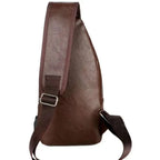 Brown leather backpack on a white background