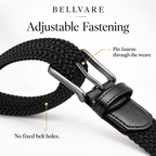 Black woven belt showing the buckle pin fastening through the braid without fixed belt holes.