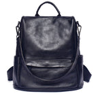 Black leather backpack on a white background